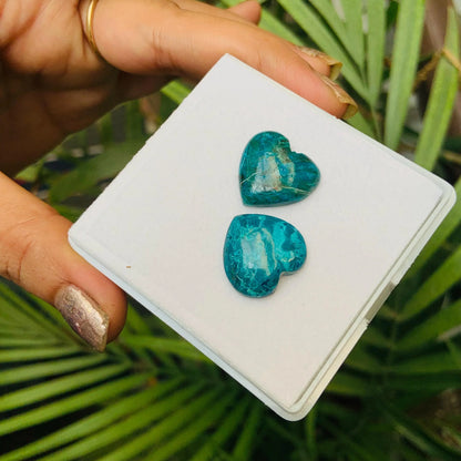 Heart-shaped blue gemstone cabochons on display, natural stone jewelry supplies